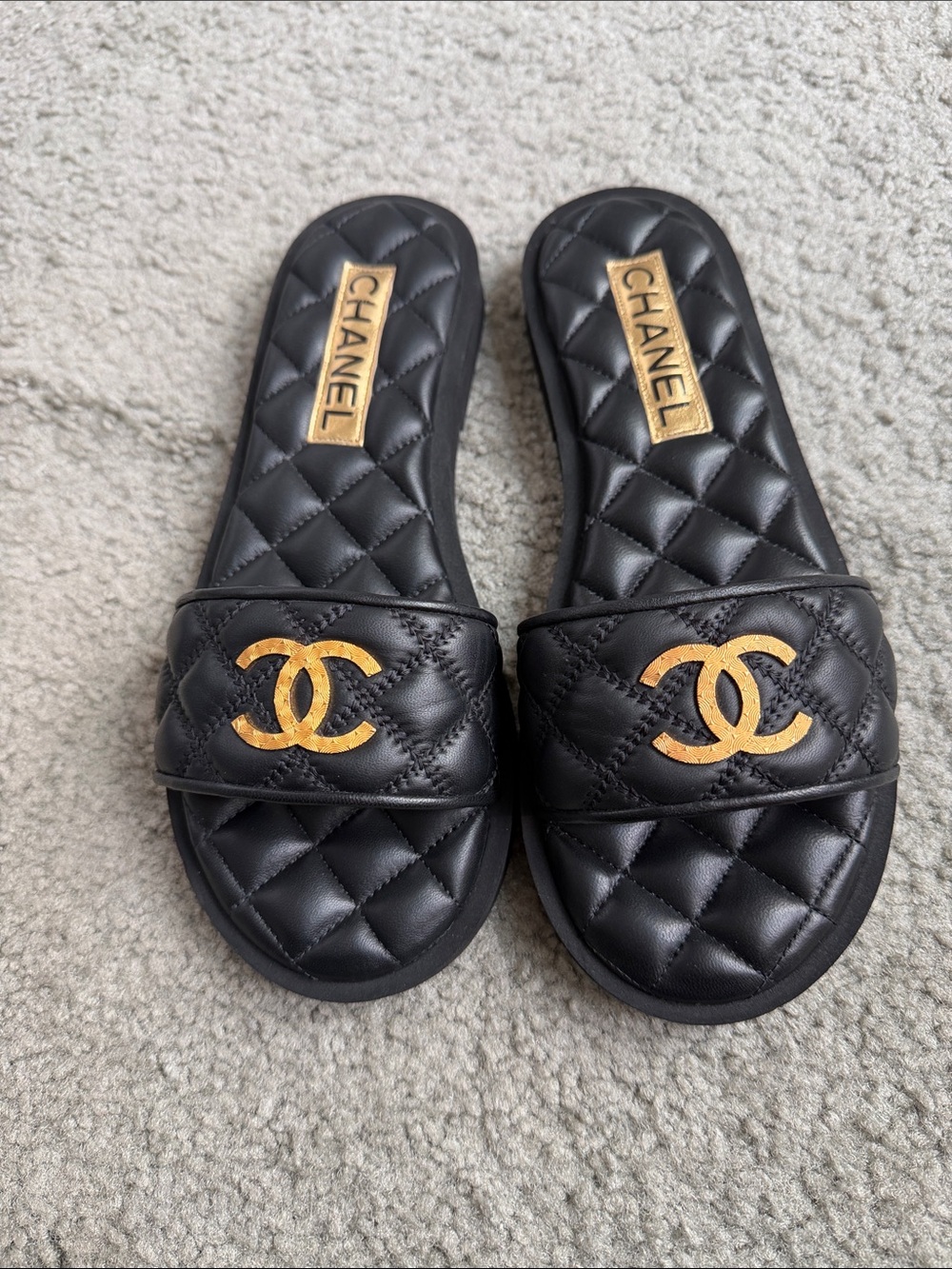 CHANEL Black Quilted Slide Sandals with Gold CC Plaques